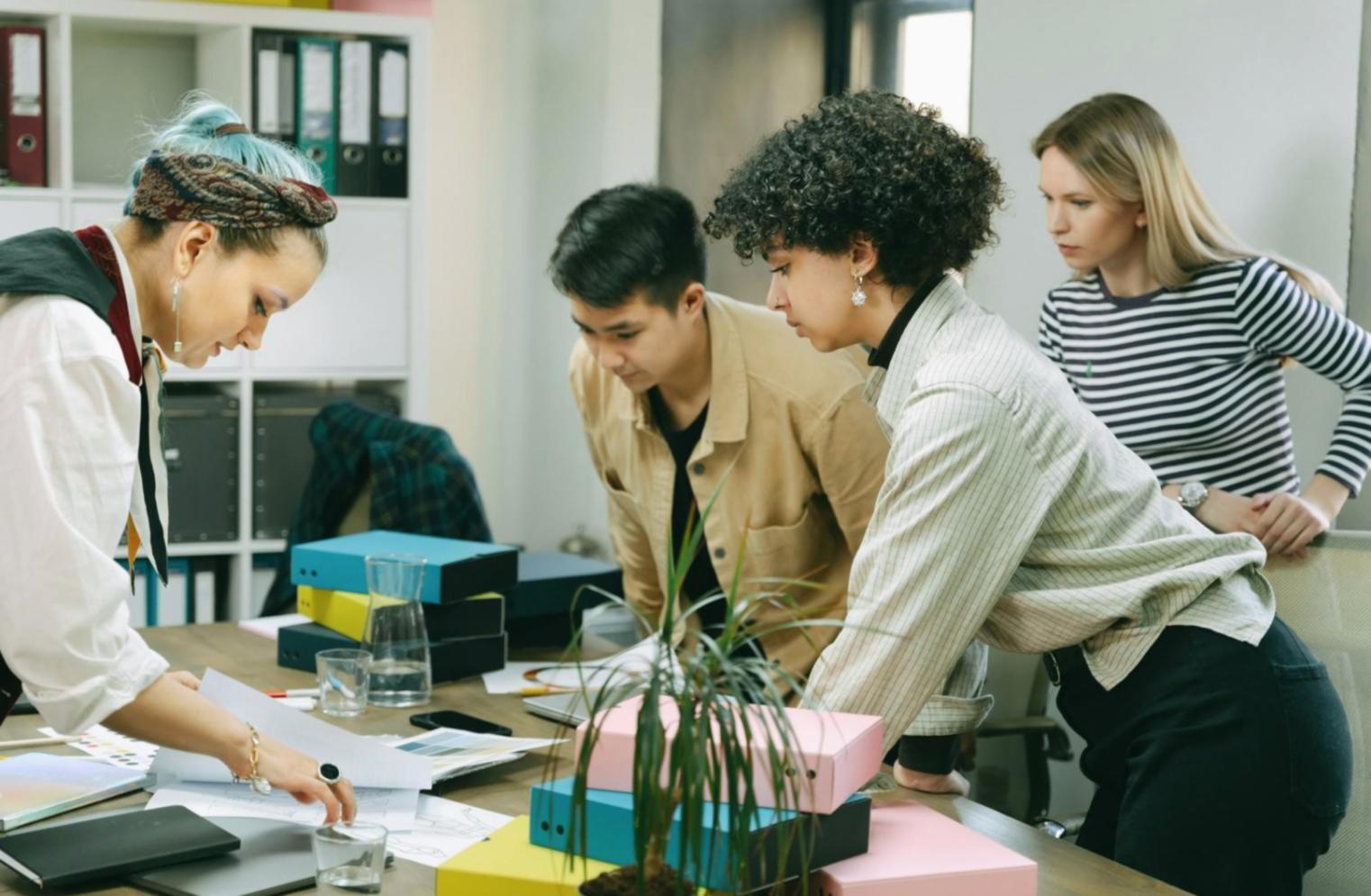 Workshop participants analyzing SEO data on screens